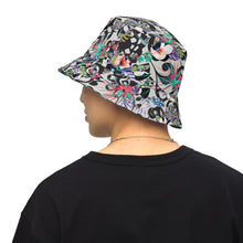 Peninsula Scrap / Saucy Safari Reversible bucket hat